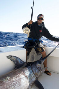 Angler with monster swordfish.