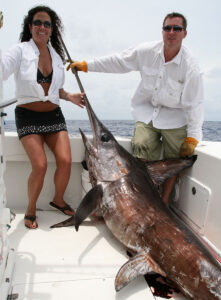 Huge swordfish captured by a husband and wife team.