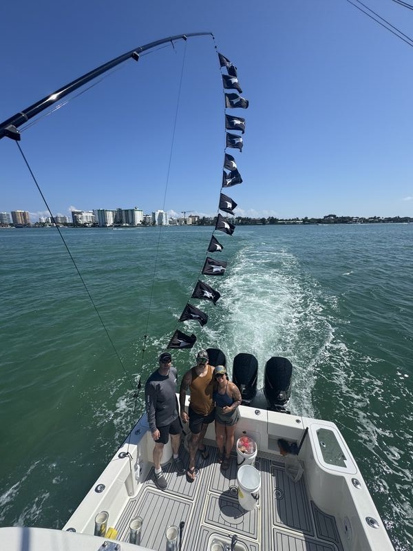 Returning to the dock with 14 sailfish release flags flying.