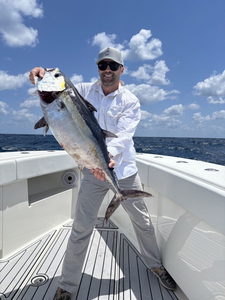 Angler holding a nice blackfin tuna.